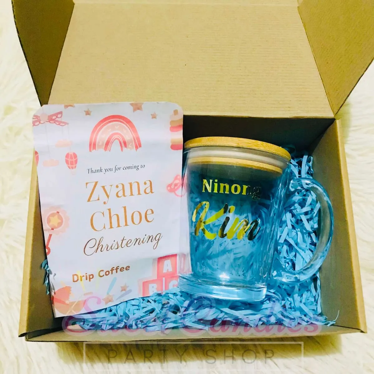 Boxed birthday gift set with personalized jars and shred fill